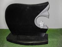 Памятник с резанными краями и мраморной фигурой Памятник с резанными краями и мраморной фигурой